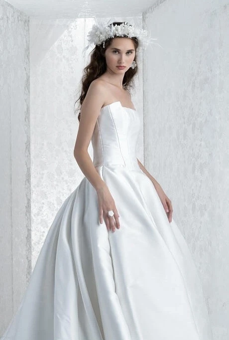 Model wearing a dress by Reem Arca