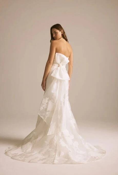 Model wearing a dress by Amsale