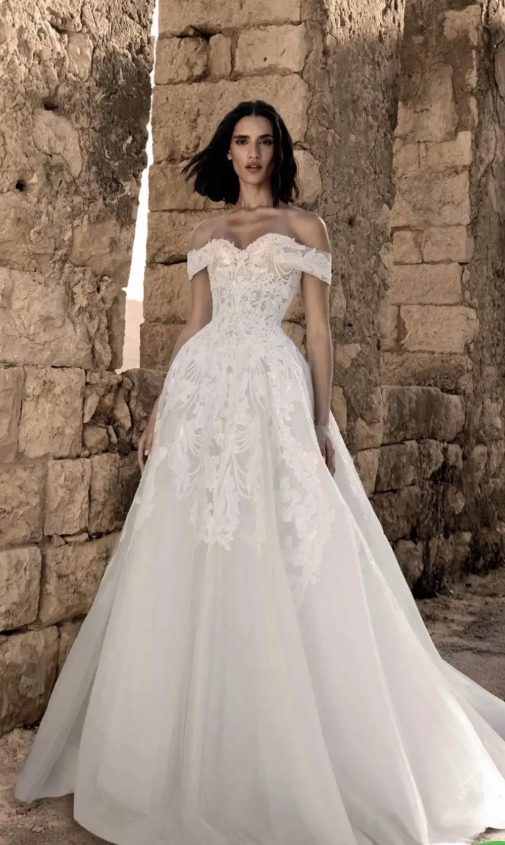 Model wearing a dress by Saiid Kobeisy