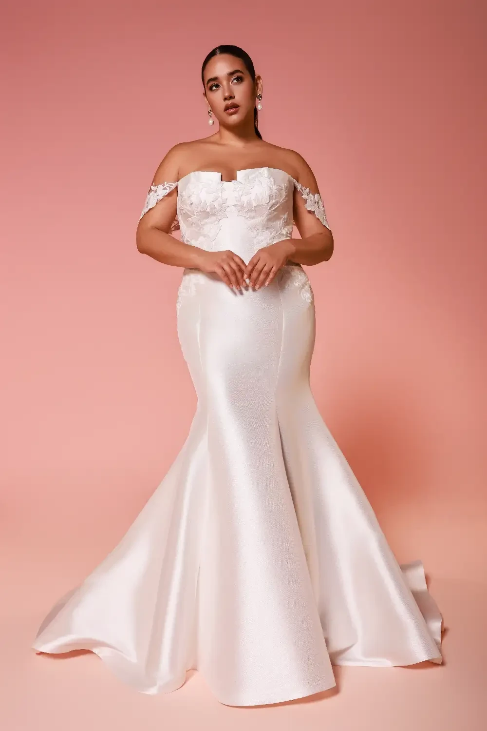 Model wearing a dress by Dany Girl