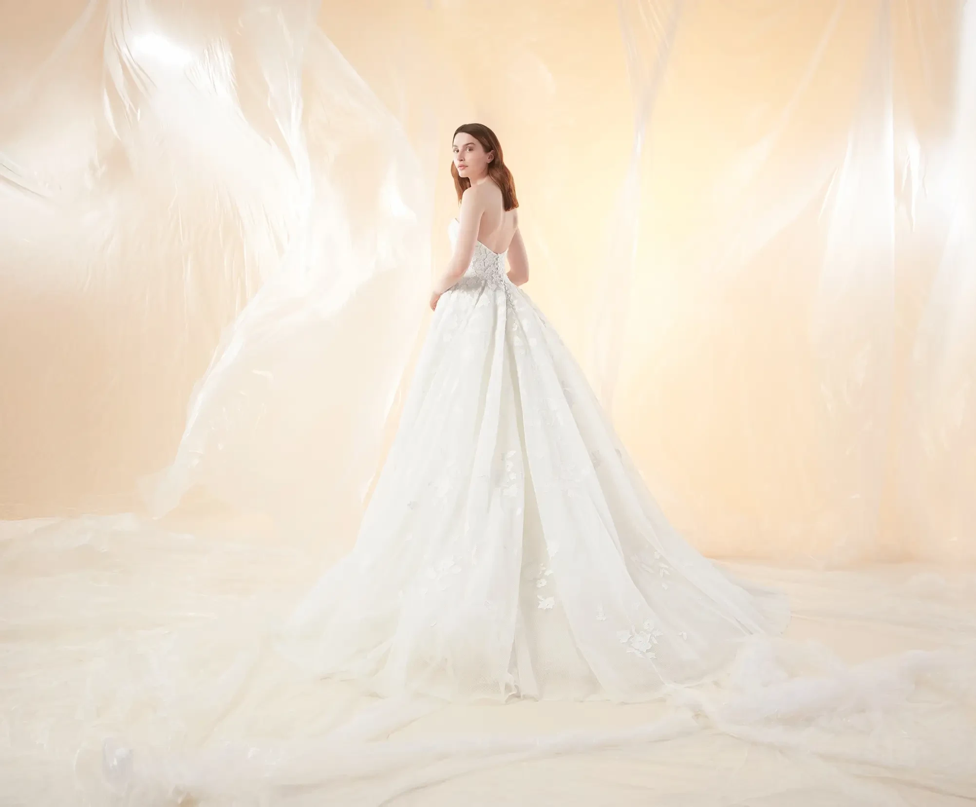 Model wearing a white gown