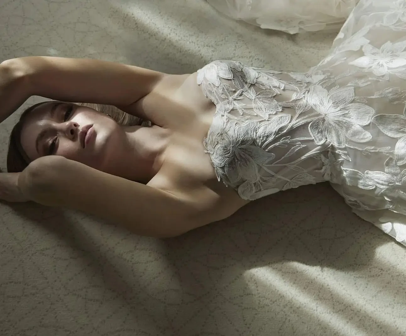 Model wearing a white gown