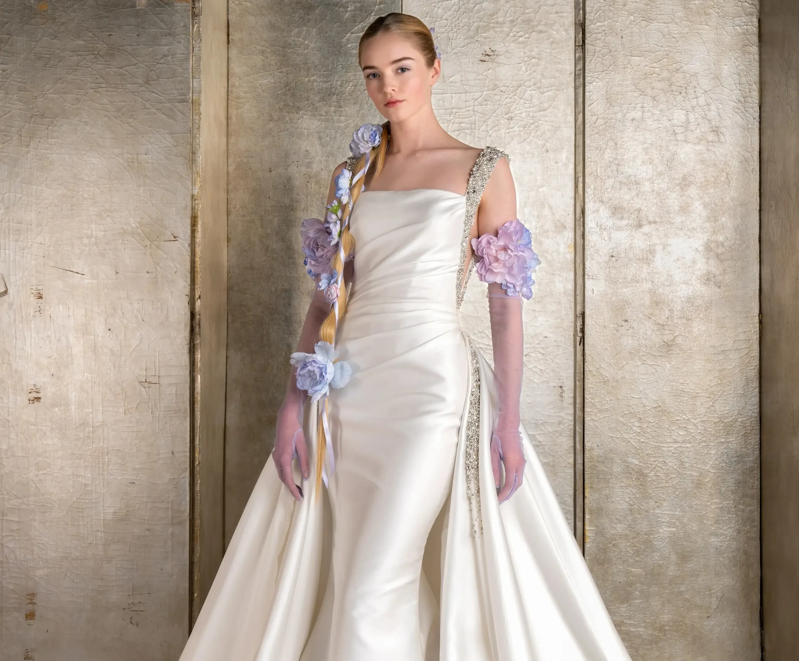 Model wearing a white gown