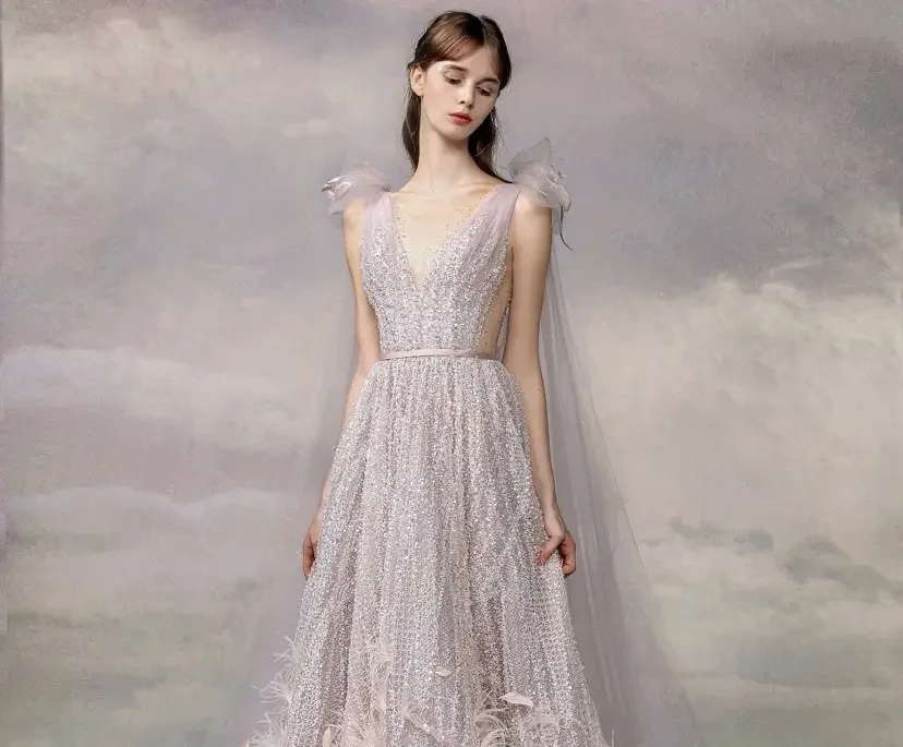 Model wearing a white gown