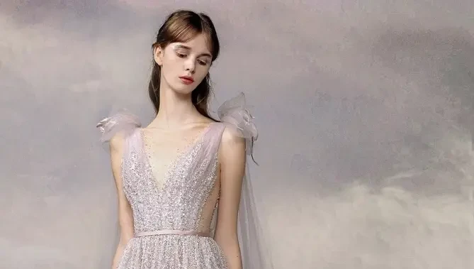 Model wearing a white gown