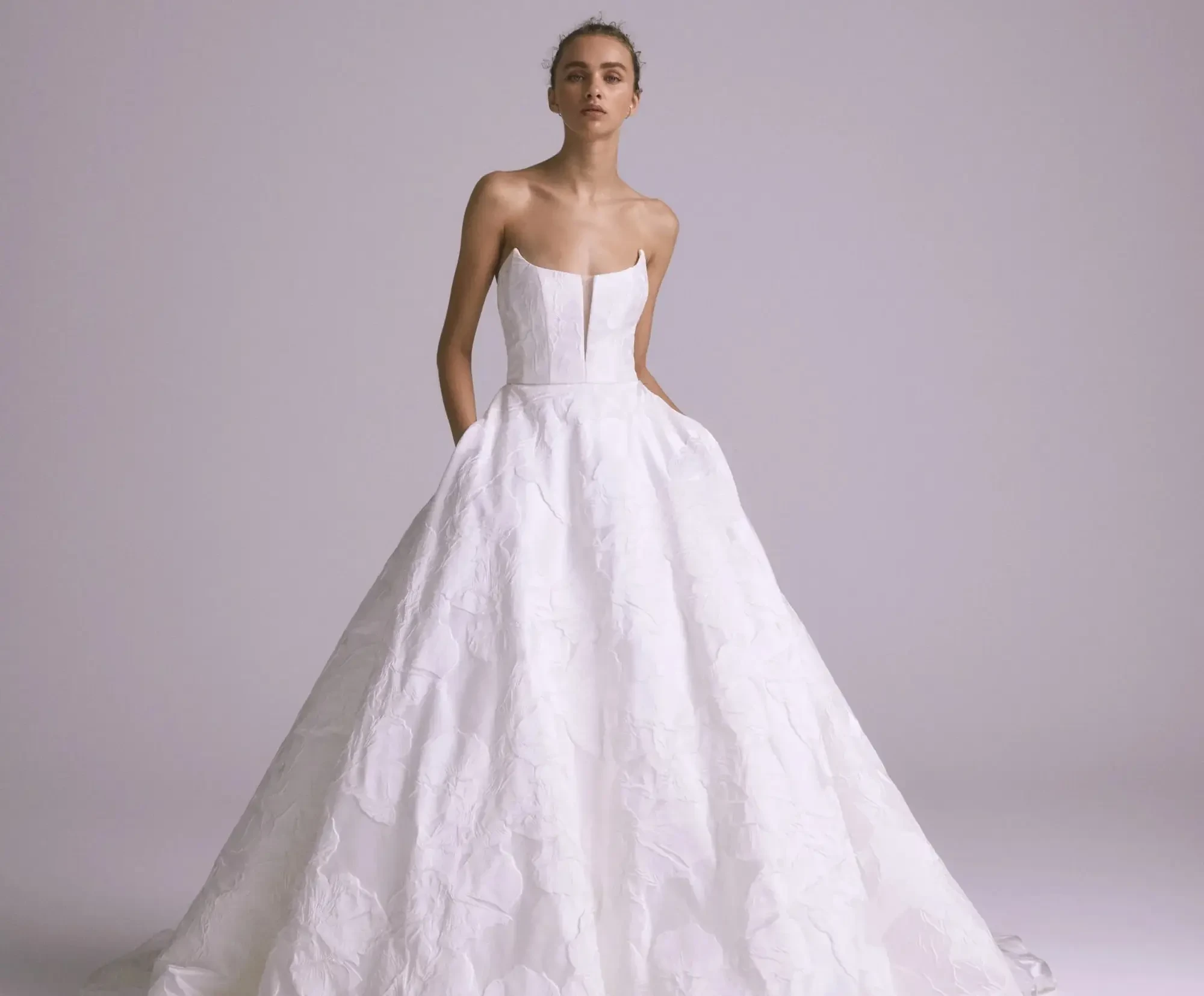 Model wearing a white gown