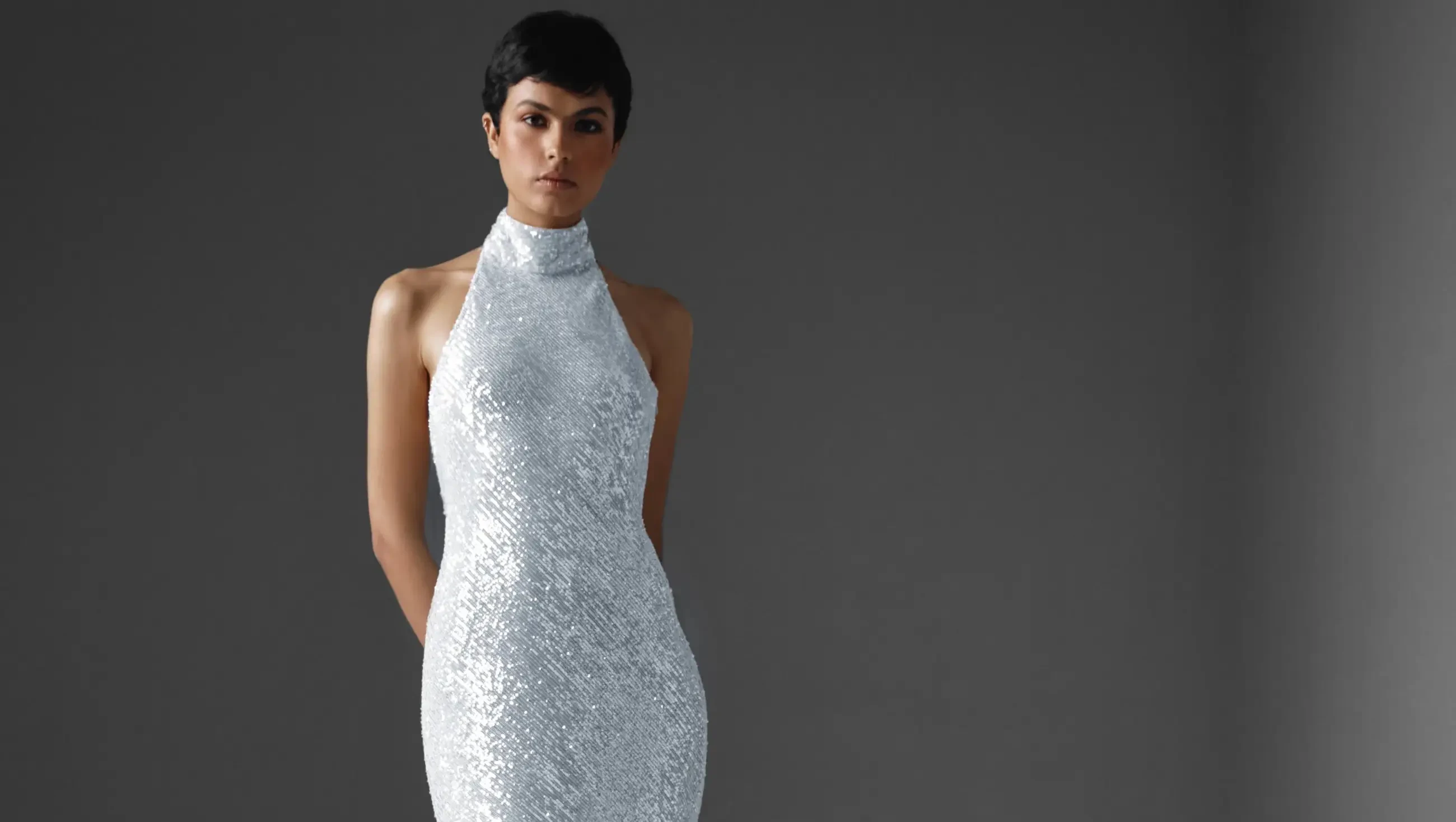 Model wearing a white gown