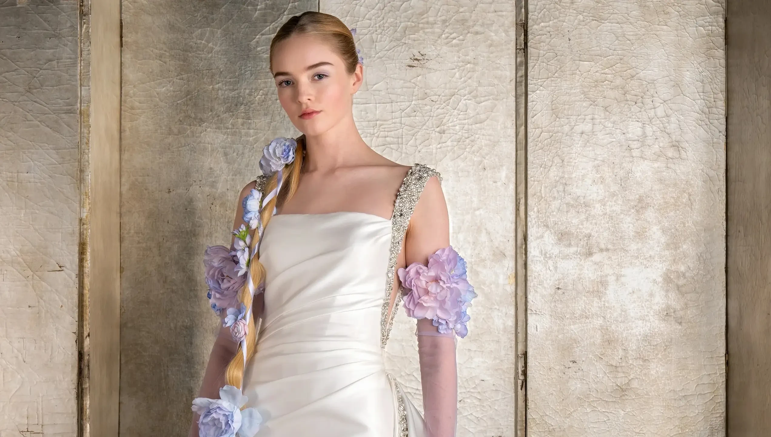 Model wearing a white gown