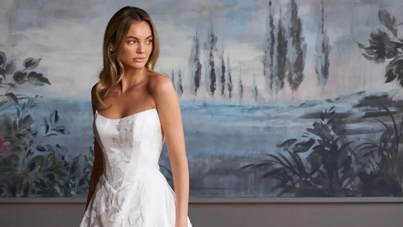 Model wearing a white gown