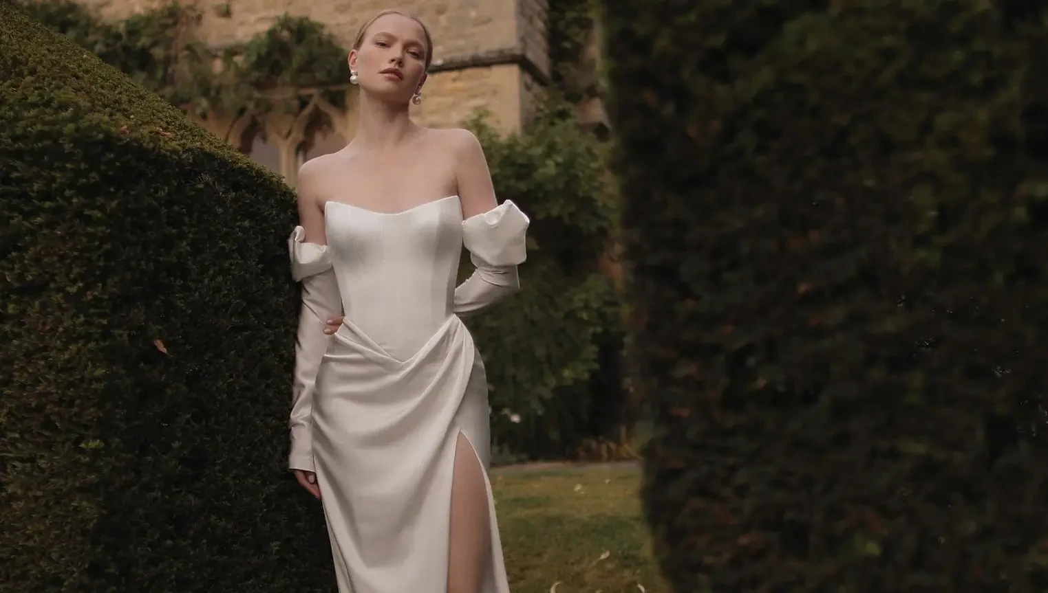 Model wearing a white gown