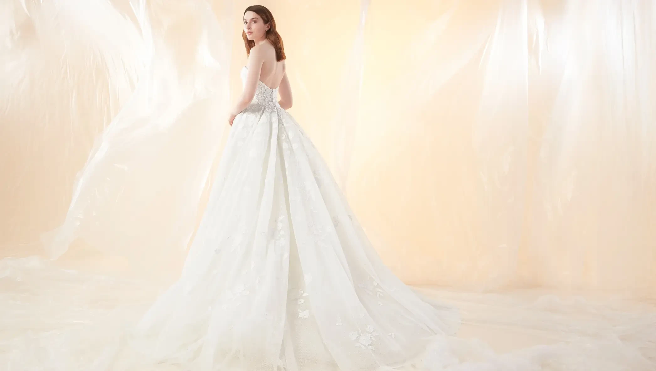 Model wearing a white gown