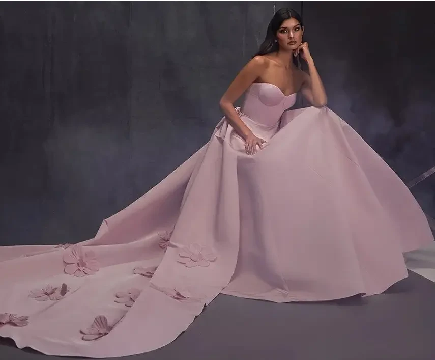 Model wearing a white gown