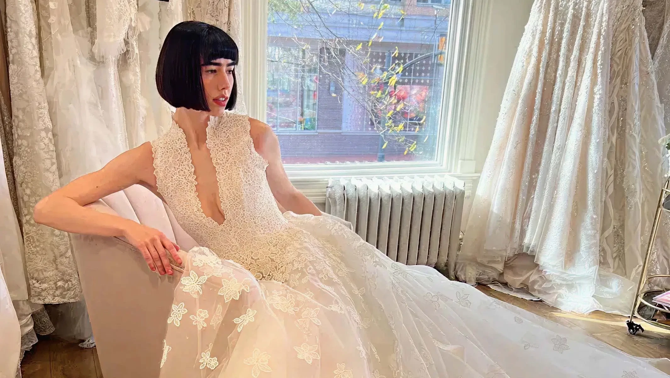 Model wearing a white gown