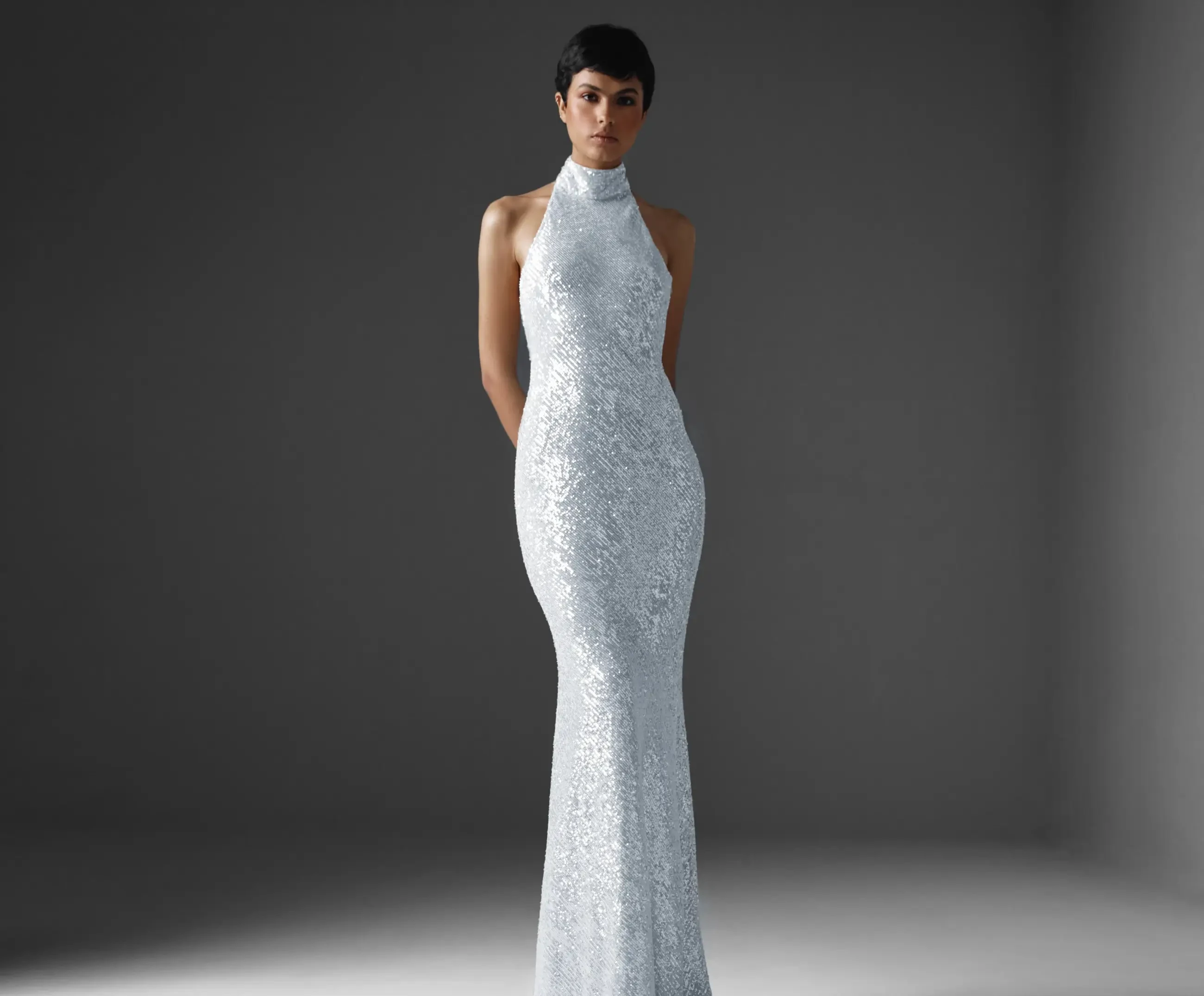 Model wearing a white gown